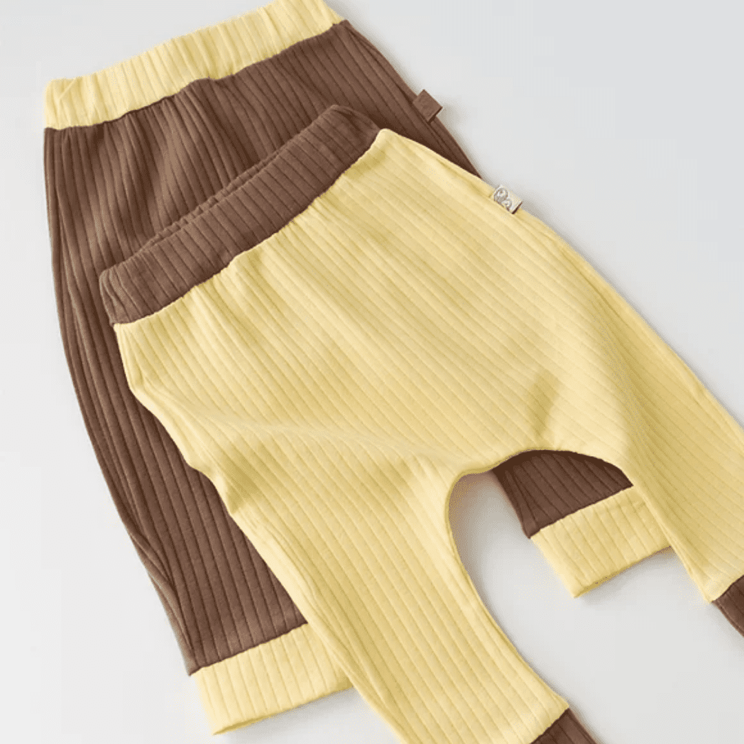 Dojčenské nohavice pruhované 2ks žlté